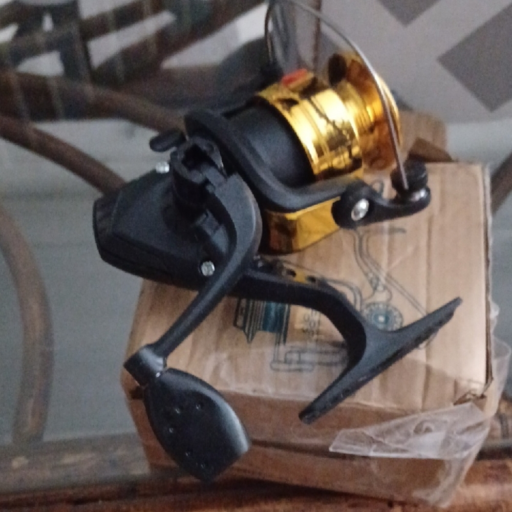 XM2003 Graphite Spining Fishing Reel NEW
